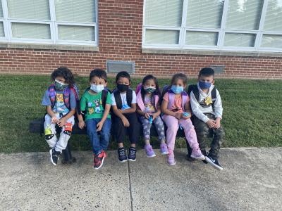 Head start students waiting for the bus.