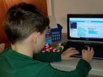 Kindergartner learned to make an Amazing World of Gumball game during Hour of Code.